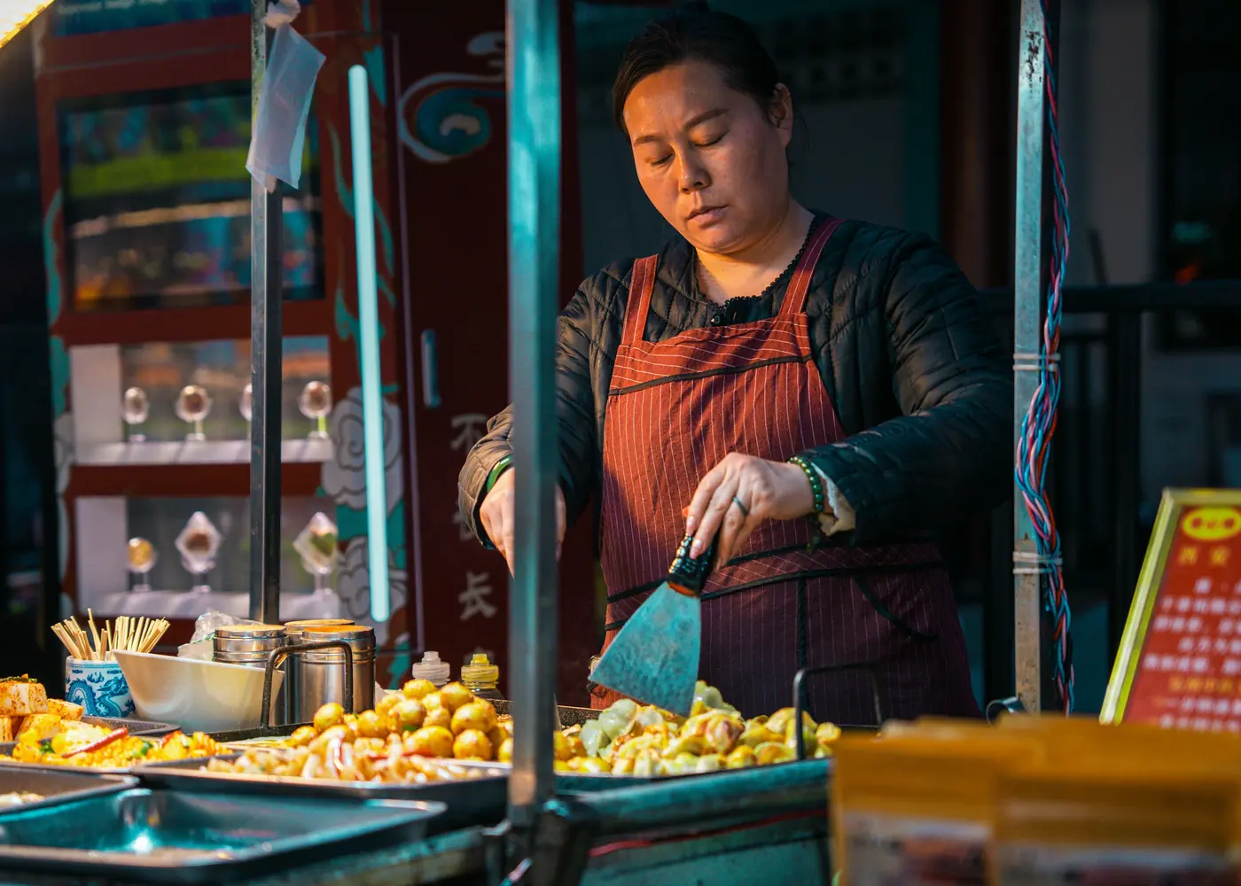A cook working at a street stall